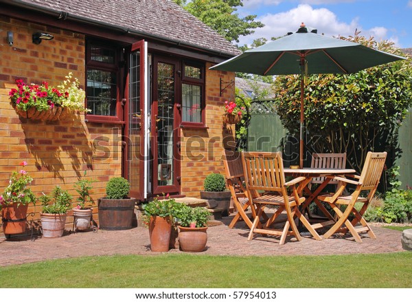 English Back Garden Patio Table Chairs Stock Photo (Edit Now) 57954013