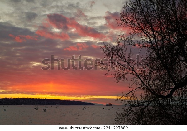 English Bay Sunset over Kitsilano. Sunset\
over Kitsilano and English Bay from The West End. Vancouver,\
British Columbia.\
\
                              \
