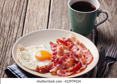 English Breakfast With Fried Eggs And Bacon, Cup Of Coffee