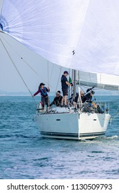 English Channel Near the Isle of Wight, UK; 7th july 2018; Crew Aboard a Yacht Racing in the round the Island Yacht Race 