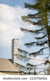 English Cottage Style Brick Chimney Showing.