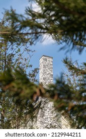 English Cottage Style Brick Chimney Showing.