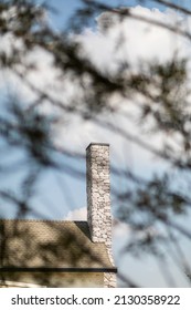 English Cottage Style Brick Chimney Showing.