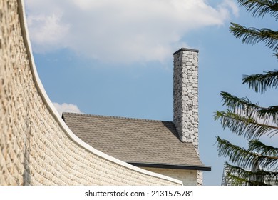 English Cottage Style Brick Chimney Showing.