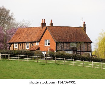 English Country Farm House Surrounded By Fields