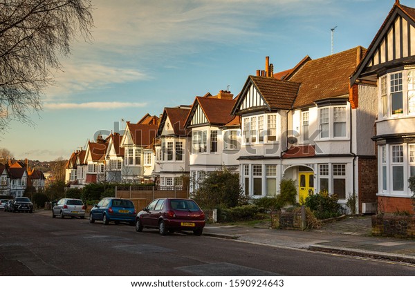 English Edwardian Houses Row On Church Stock Photo (Edit Now) 1590924643