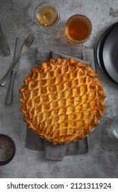 English Meat Pie. Pork Pie. Traditional British Pie. Freshly Baked Homemade Savory Pies With Golden Crust. Traditional Lattice Top Savoury Pork Pie. Food Photography, Food Styling. English Cuisine.