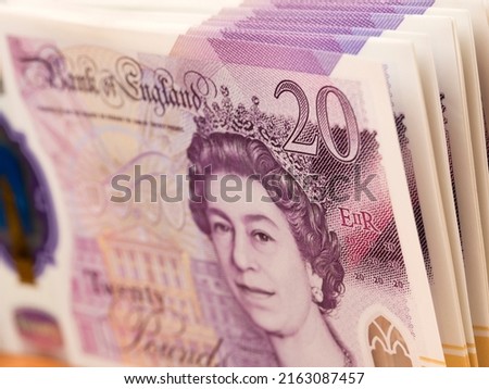 English money - 20 Pounds - a business background