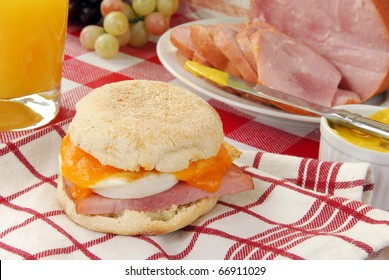 An English Muffin With Ham, Egg And Cheese