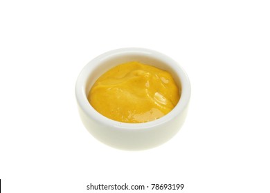 English Mustard In A Ramekin Isolated Against White