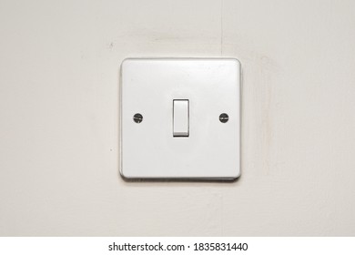 English old school light switch on a white background