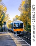 English passenger commuter train rural railway station West Midlands England UK