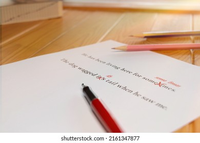 English Sentences With Red Mark Of Its Grammar Error For Proofreading