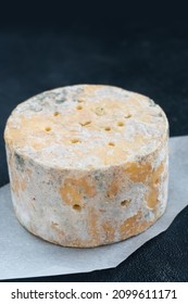 English Stilton cheese with blue mold. - Shutterstock ID 2099611171