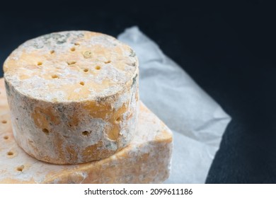 English Stilton cheese with blue mold. - Shutterstock ID 2099611186