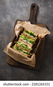 English Tea Sandwiches With Cream Cheese, Dill, Cucumber On Brown Background. Cold Traditional Tasty Appetizer. View From Above. Vertical,