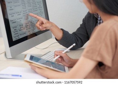 English teacher asking student to read sentences on computer screen
