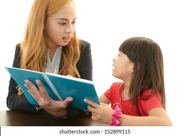 English Teacher With Girl Studying.