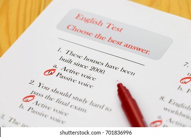 English Test With Red Pen On Desk