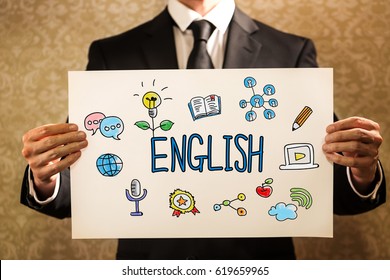 English text with businessman holding a sign board - Shutterstock ID 619659965