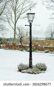 English Winter Garden Or Back Yard Covered In Snow, UK