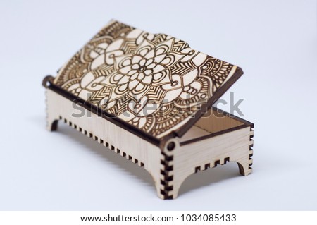 Engraving wooden box on white background