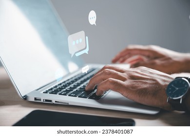 Engrossed in her laptop, a businessman navigates the social media and online marketing sphere. This exemplifies the modern concept of business in a digitally-driven world.