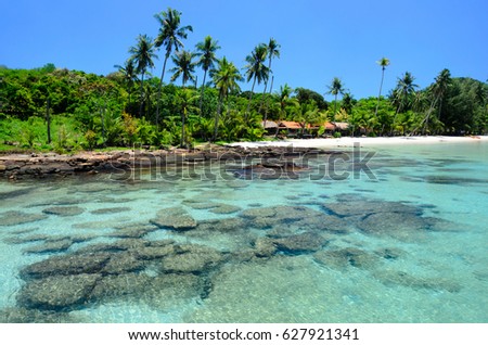 Enjoin a good summer time on the beach with clear water and blue sky at Bang Bao Beach on Koh Kood island in Gulf of Thailand