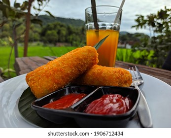 Enjoy 2 Pcs Of Fried Food Within The Nature