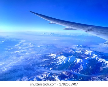 Enjoy the beauty of winter on the plane - Powered by Shutterstock
