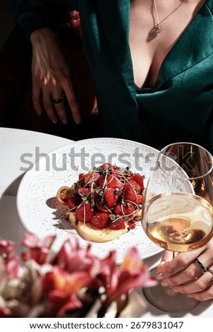 Enjoy an Elegant Dining Experience Featuring a Gourmet Dish Paired