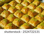 Enjoy the mouthwatering and delicious Baklava Slices that come with a delightful Pistachio Topping