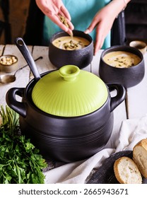 Enjoy preparing a delicious soup using stylish and highquality cookware
