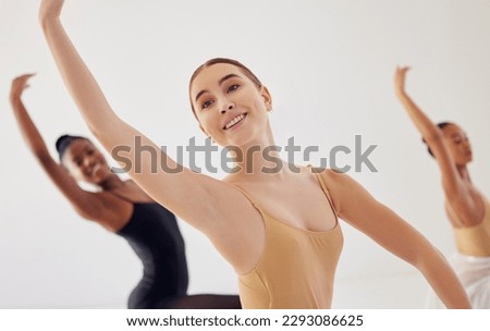 Enjoy the process of learning to dance. a group of ballet dancers practicing a routine in a dance studio.