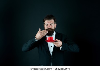 Enjoy Its Unique Flavor Notes. Hipster Enjoy Coffee Aroma. Bearded Man Sniff Aromatic Drink. Pleasant Sensory Experience. Morning Beverage. Breakfast Tea. Smell And Enjoy. Take Pleasure And Enjoy.