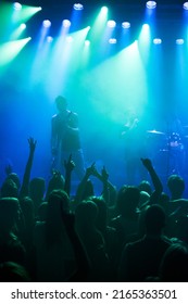 Enjoying Every Song They Play. Shot Of A Large Crowd At A Music Concert- This Concert Was Created For The Sole Purpose Of This Photo Shoot, Featuring 300 Models And 3 Live Bands. All People In This