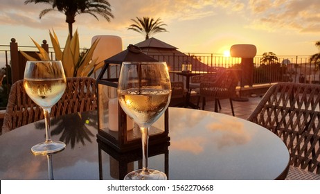 Enjoying A Glass Of Wine In The Sunset Of Tenerife