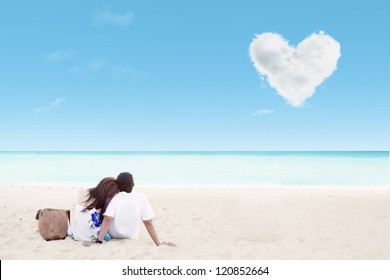 Enjoying Honeymoon At White Sand Beach With Love Cloud