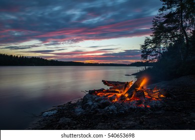 Enjoying Midsummer By A Bonfire