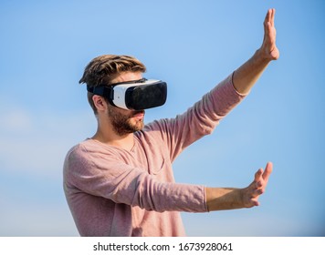 Enjoying New Experience. Create Own Business. Play Virtual Game. Sexy Man Sky Background Vr Glasses. Male Reality In Digital World. Use Vr Headset. Macho Man Wear Wireless VR Glasses..