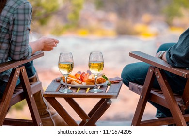 Enjoying Some Wine While Luxury Camping In The Desert