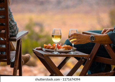 Enjoying Some Wine While Luxury Camping In The Desert