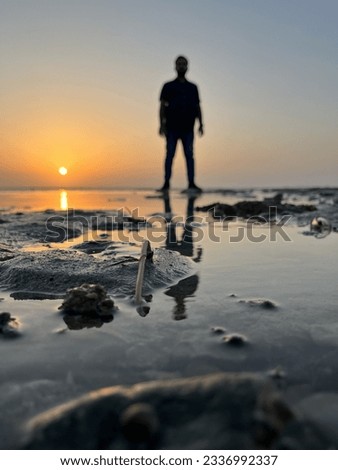 Similar – Image, Stock Photo Man with pipe in midnight sun at the fjord