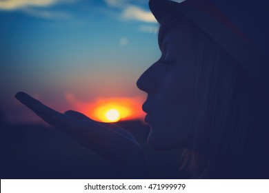 Enjoying the sunset/sunrise. Shallow depth of field. - Shutterstock ID 471999979