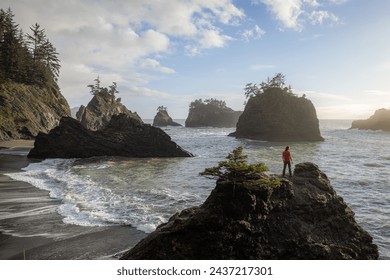 Enjoying the view of the rocky shore line and sea stacks of this stretch of coast line in southern Oregon, Secret beach around sunset. - Powered by Shutterstock