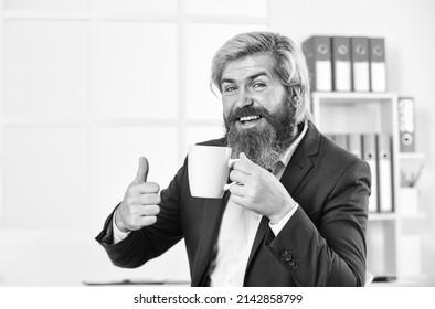 Enjoyment. Tea time. You have to trust your instincts. Relax and keep calm. Drink coffee. Bearded man drinking hot beverage. Breakfast tea. Morning beverage. Businessman drink coffee in office