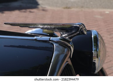 Enkhuizen, The Netherlands - July 17 2022: Hood Ornament On Black Classic Citroën Traction Avant Car