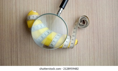 Enlarge Penis Size Illustration Using A Banana, Measuring Tape And A Magnifying Glass