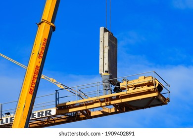 enns, austria, 04 feb 2021, mounting of a crane at the health center