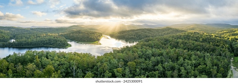 Enoggera Reservoir on a cloudy afternoon. The sun poked its head out through the clouds on a few occasions, which made for some stunning shots! - Powered by Shutterstock